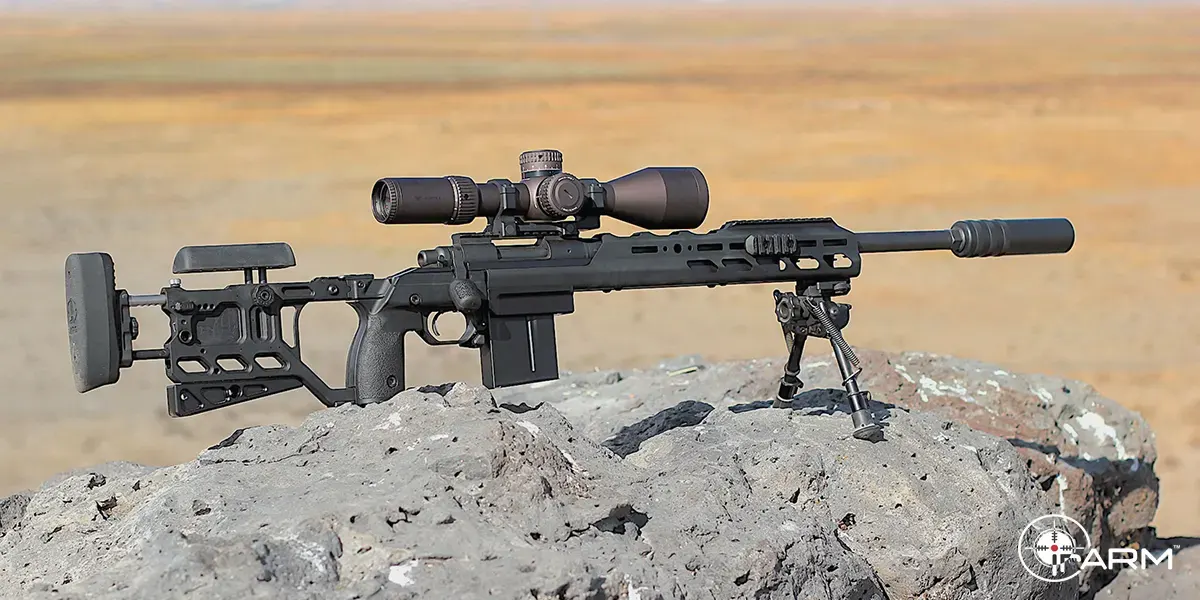 A sniper rifle with thermal scope in the filed.